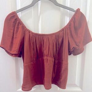 burnt orange/ rust blouse